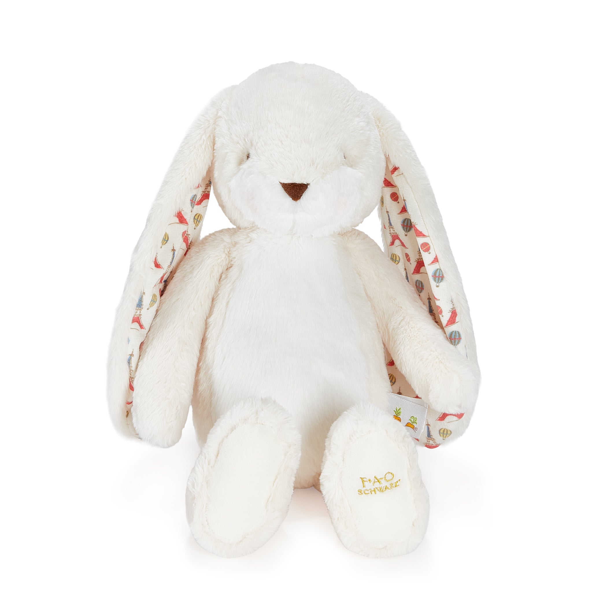 White plush bunny with patterned ears on a white background