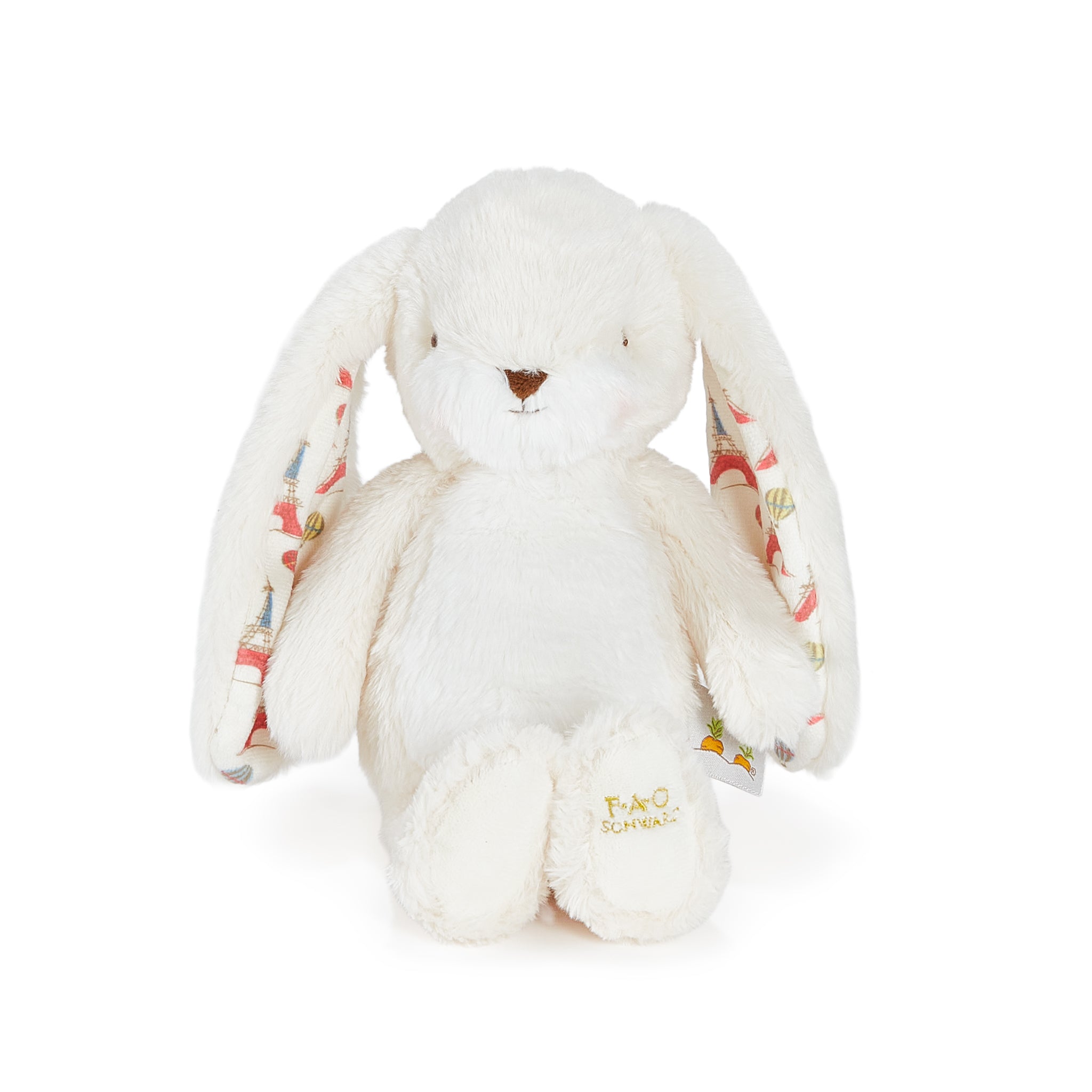 White plush bunny with colorful patterned ears on a white background