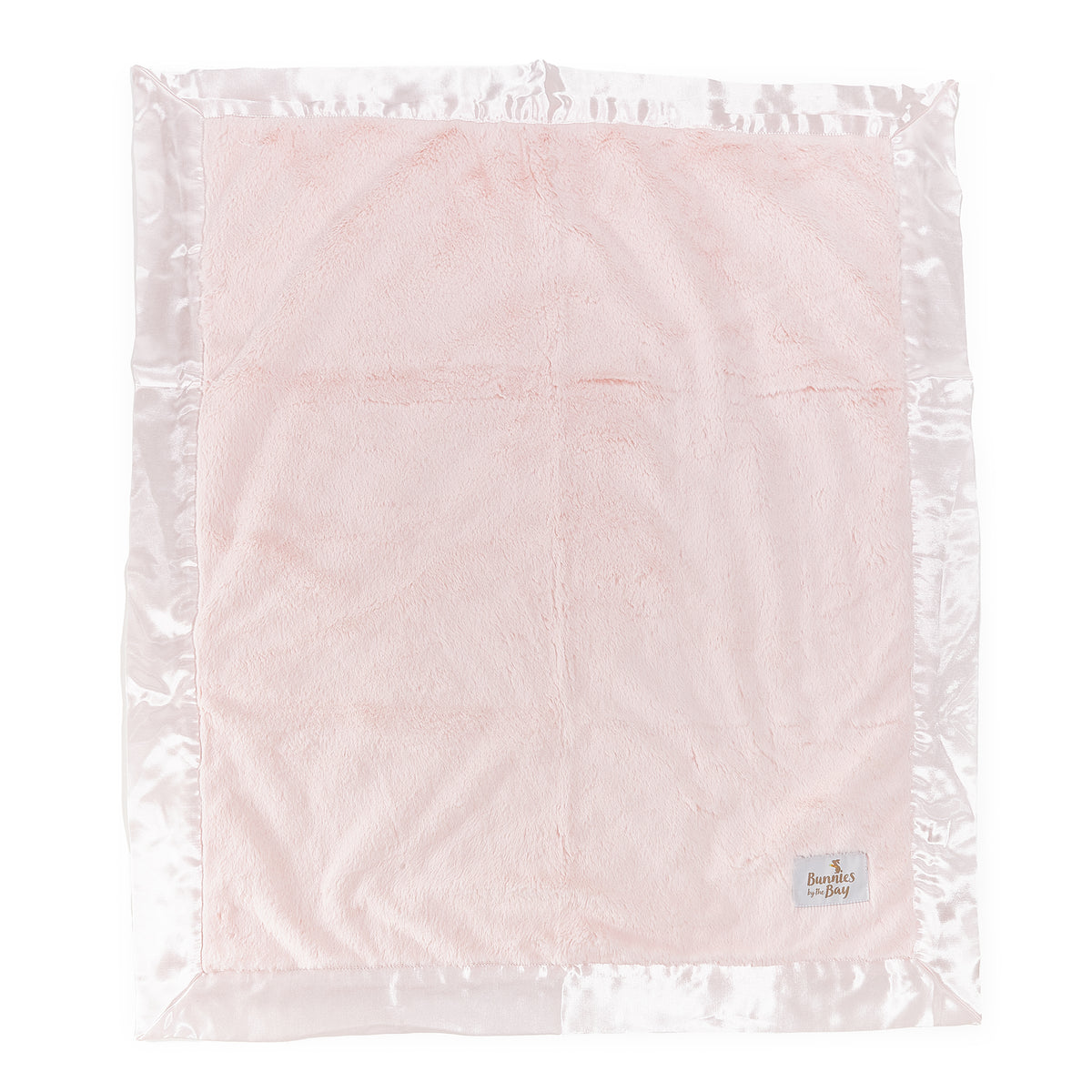 A light pink plush blanket with a shiny light pink satin border, shown flat against a white background. A small woven label is visible in the bottom right corner.