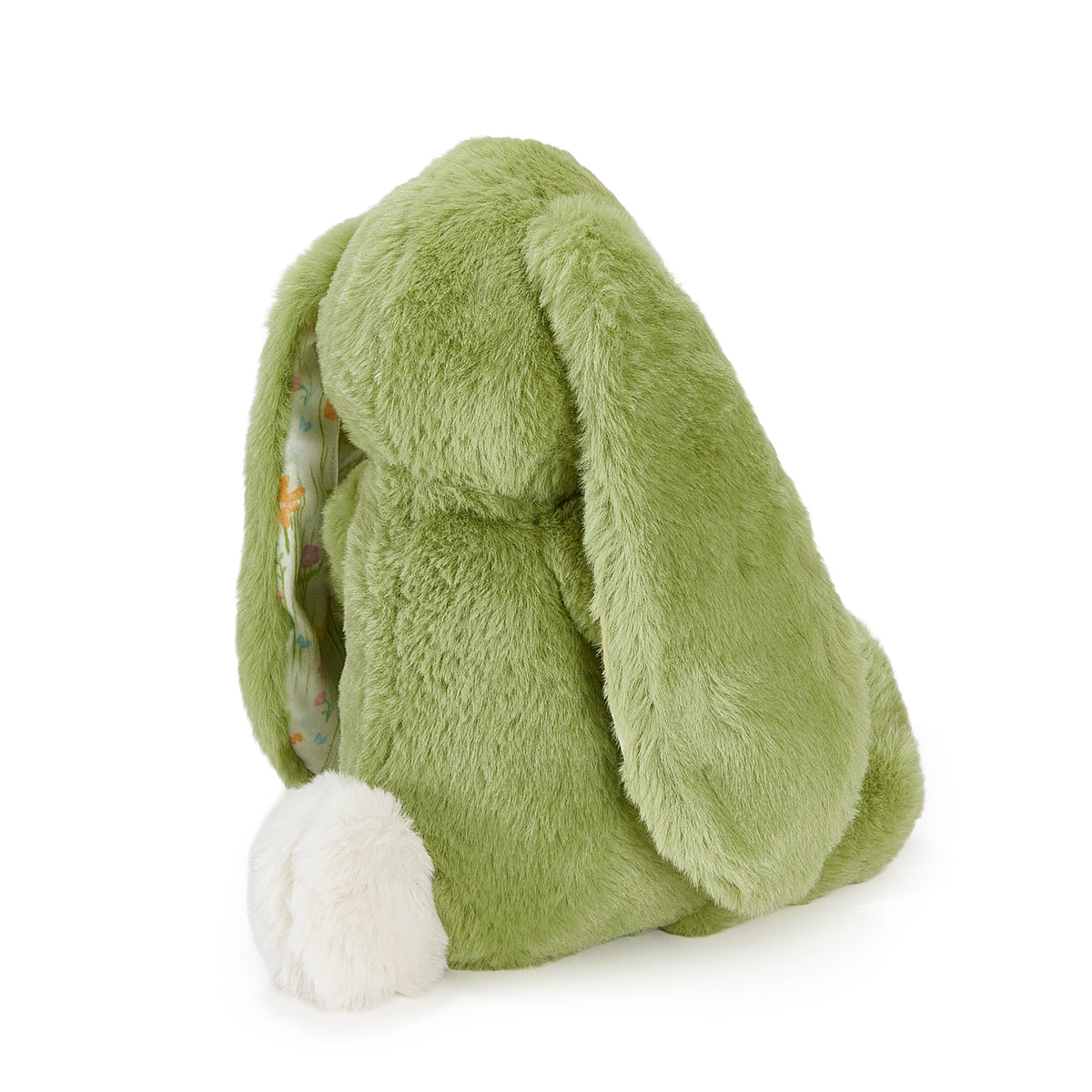 A plush green bunny stuffed animal with long floppy ears and a white fluffy tail, photographed on a clean white background.