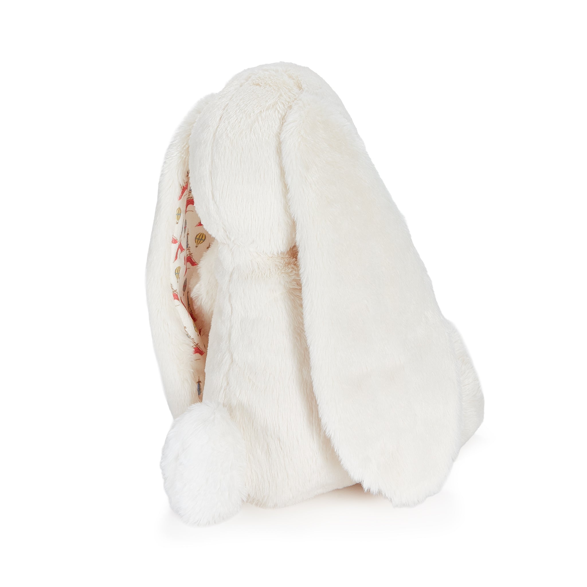 White plush bunny toy on a white background
