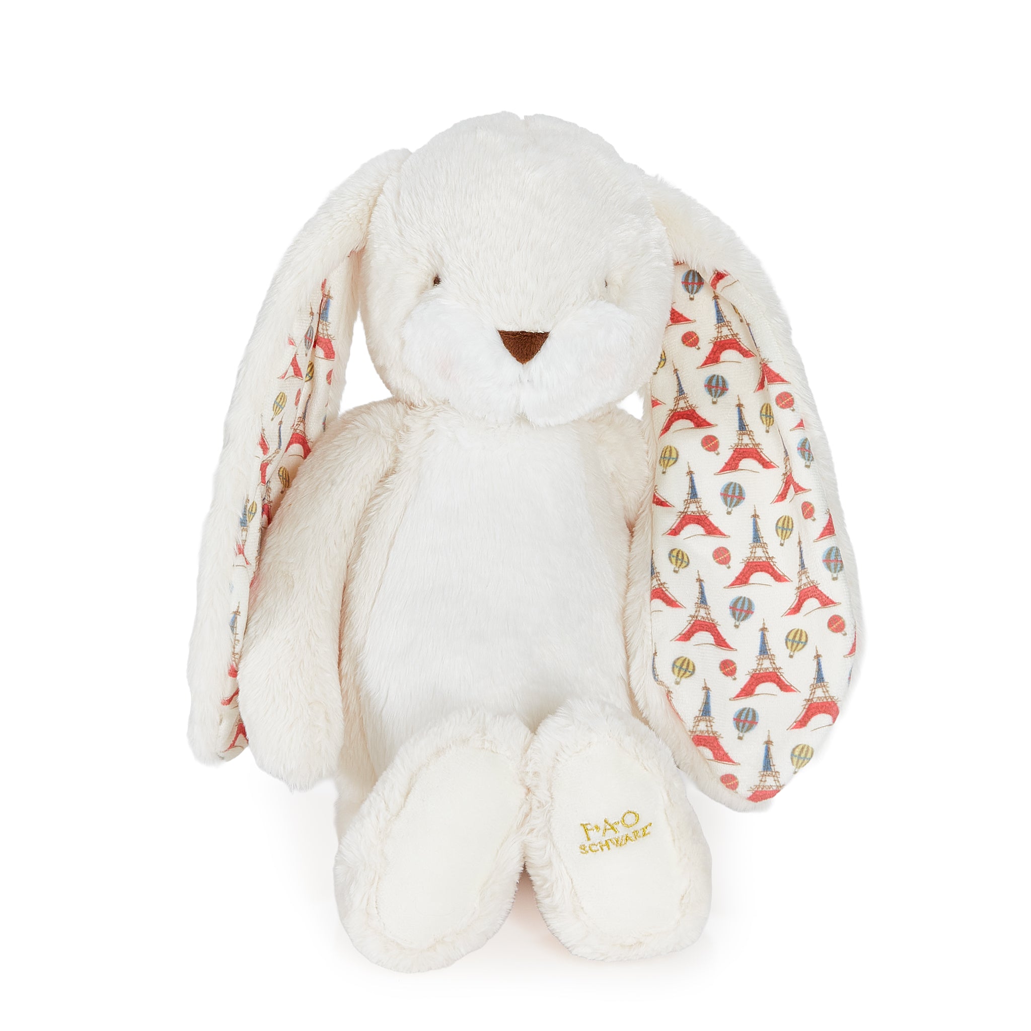 White plush bunny with patterned ears on a white background