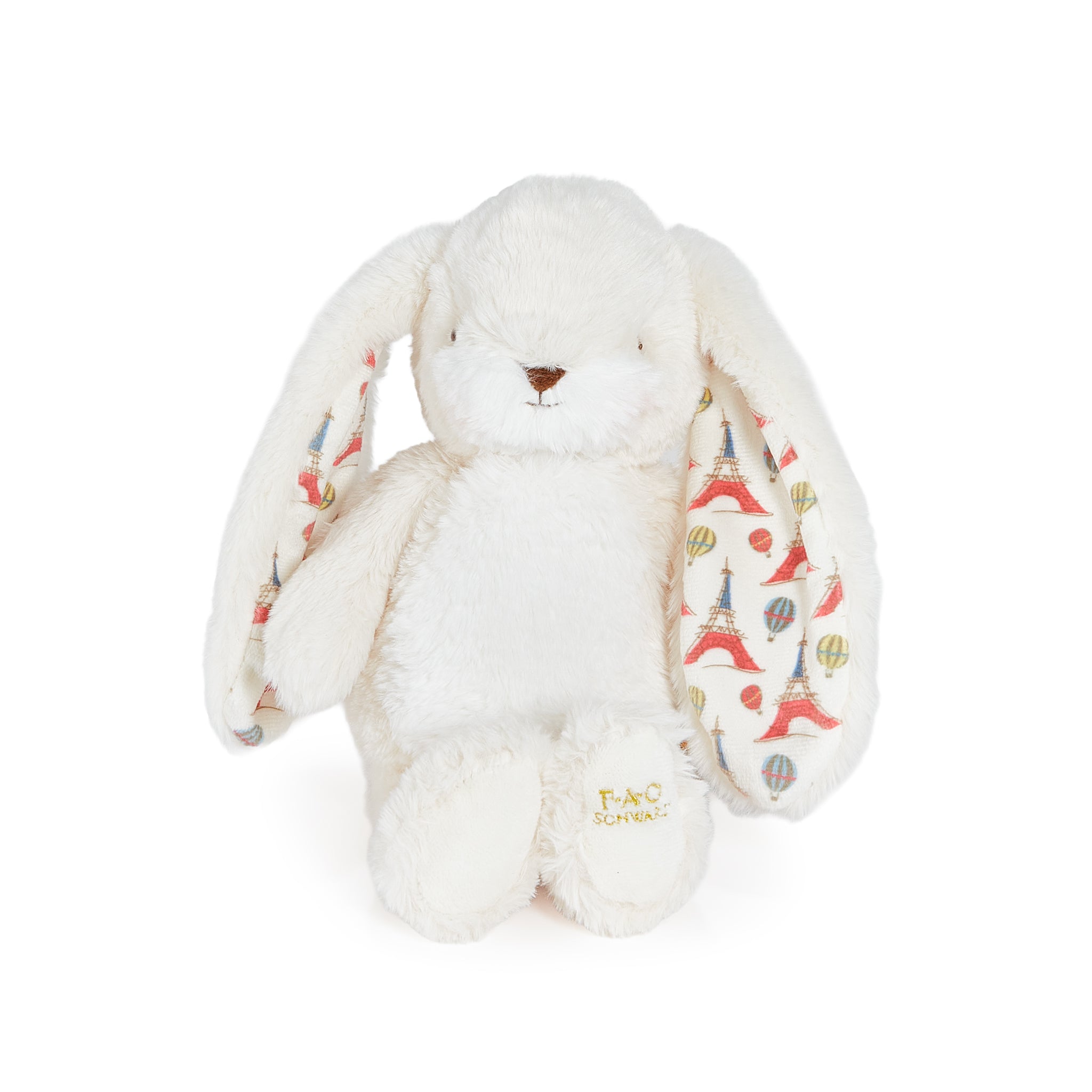White plush bunny with patterned ears on a white background