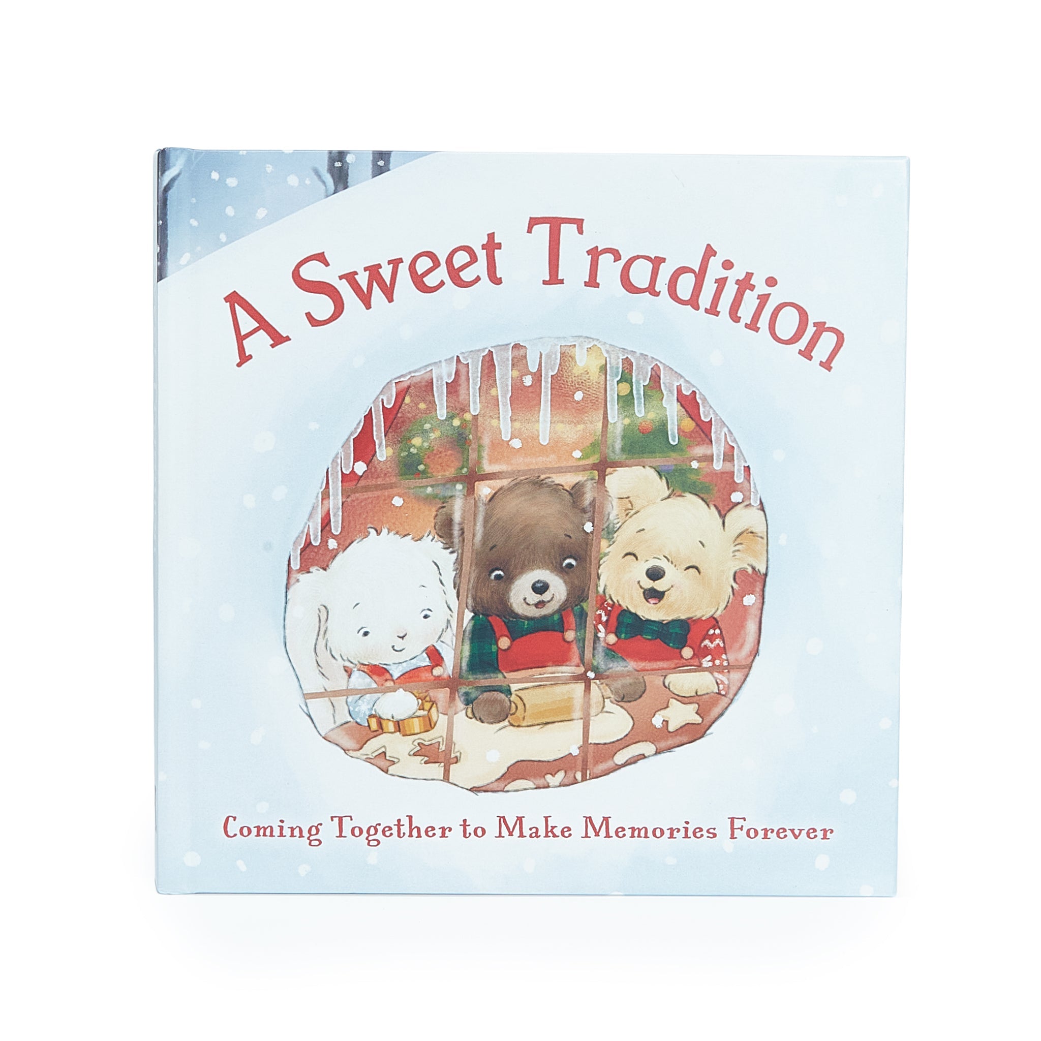 Book titled 'A Sweet Tradition' with illustrations of three animals on a snowy background.