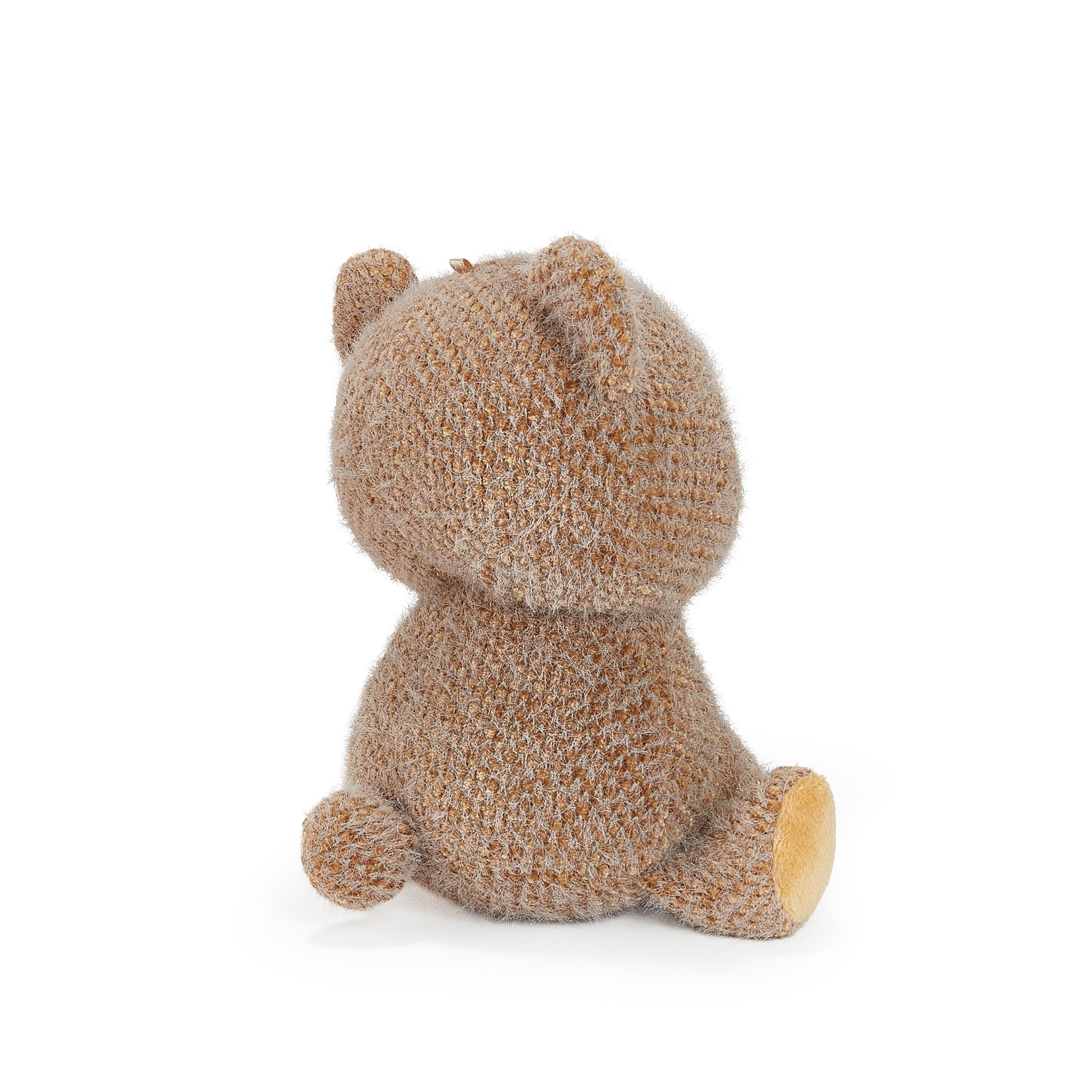 Plush toy bear with a textured brown pattern on a white background