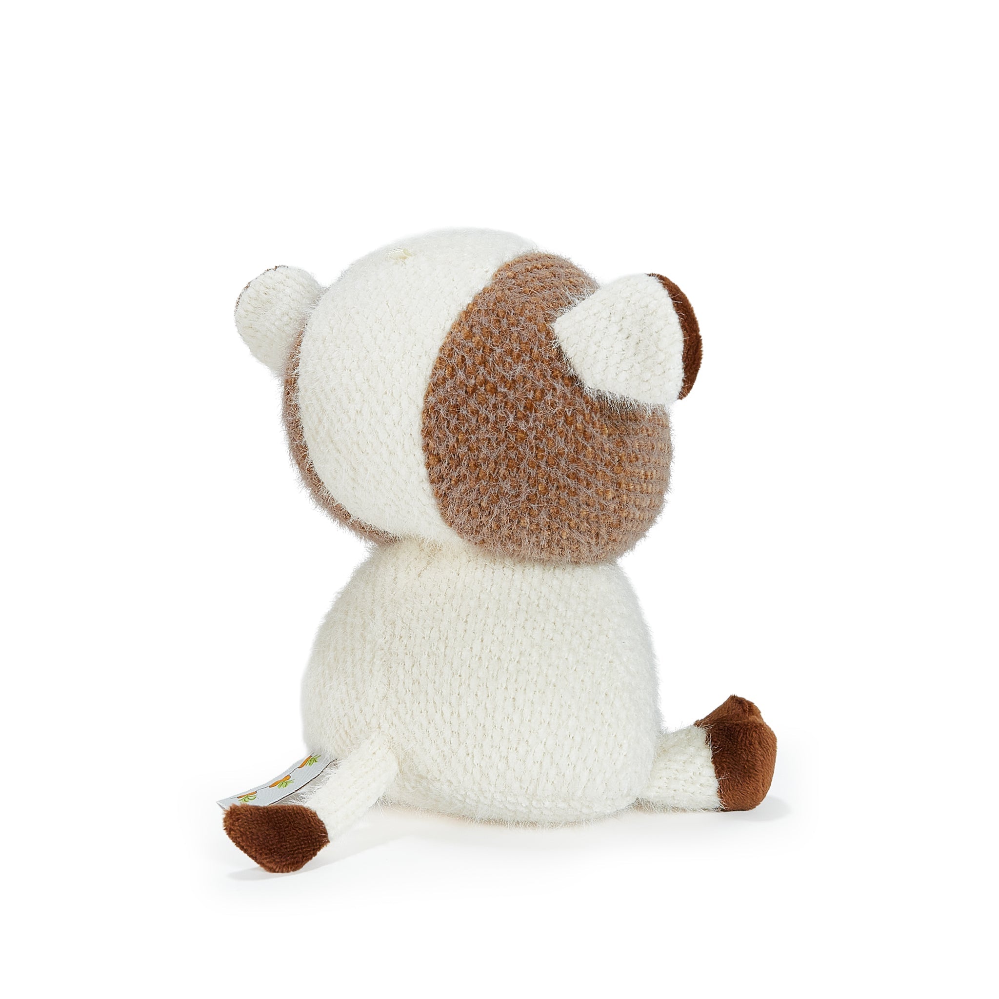 Small plush toy with a brown and white pattern on a white background