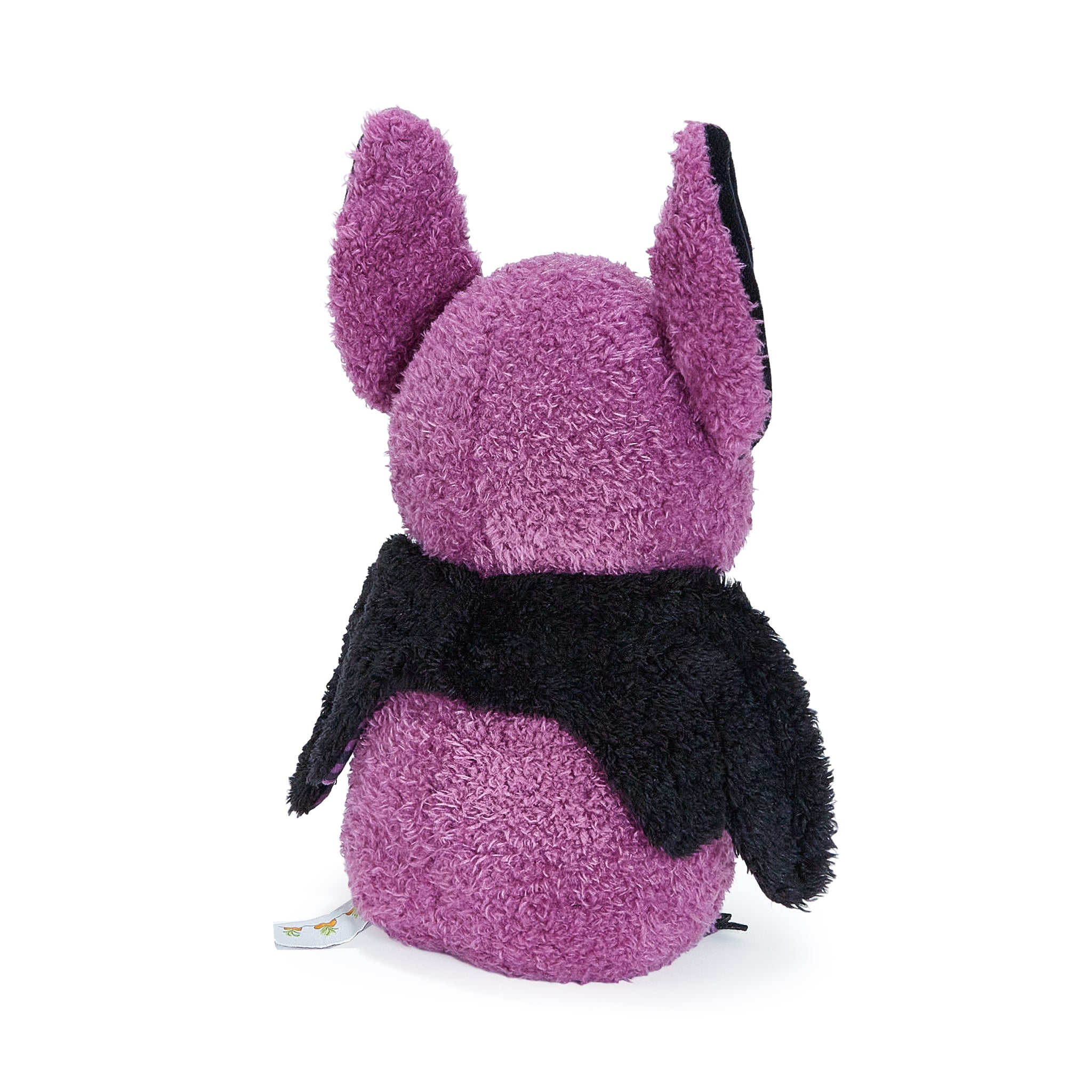 Purple plush bat toy with black accents on a white background