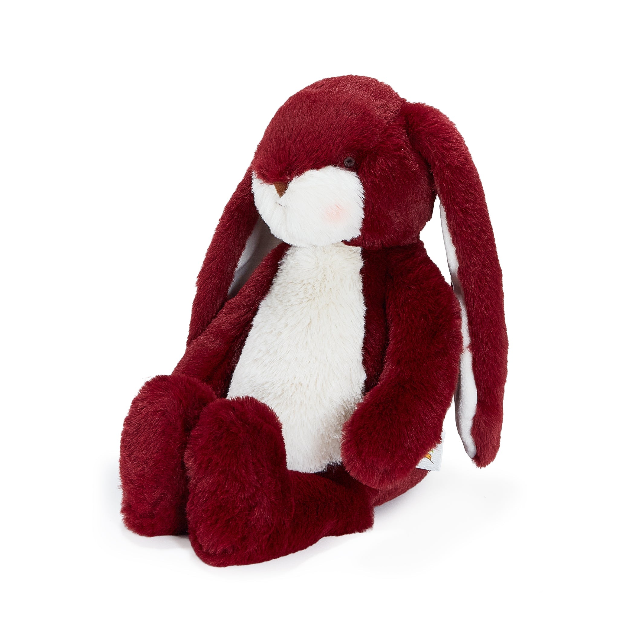 Red plush bunny toy on a white background