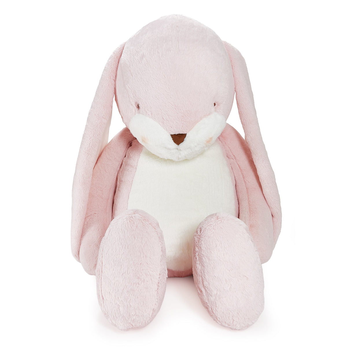 A soft pink plush bunny toy with long floppy ears, a cream-colored belly and muzzle, and small embroidered eyes, photographed on a clean white background.