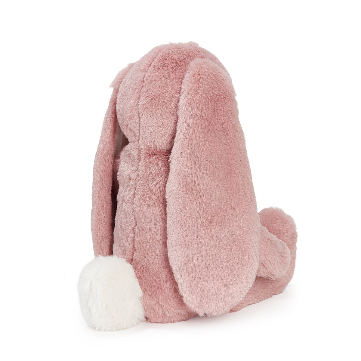 A pink plush bunny toy with long floppy ears, a cream-colored belly and muzzle, and small embroidered eyes, sitting against a plain white background.
