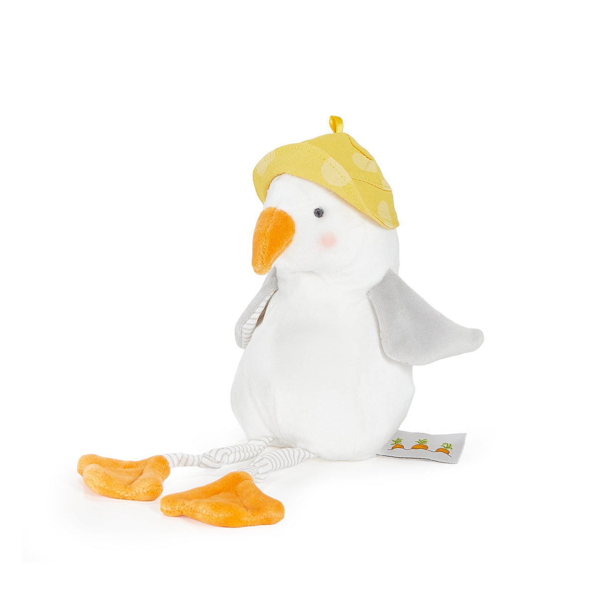 A plush seagull toy sitting on a white background, wearing a yellow patterned hat, orange beak, gray wings, and orange feet.