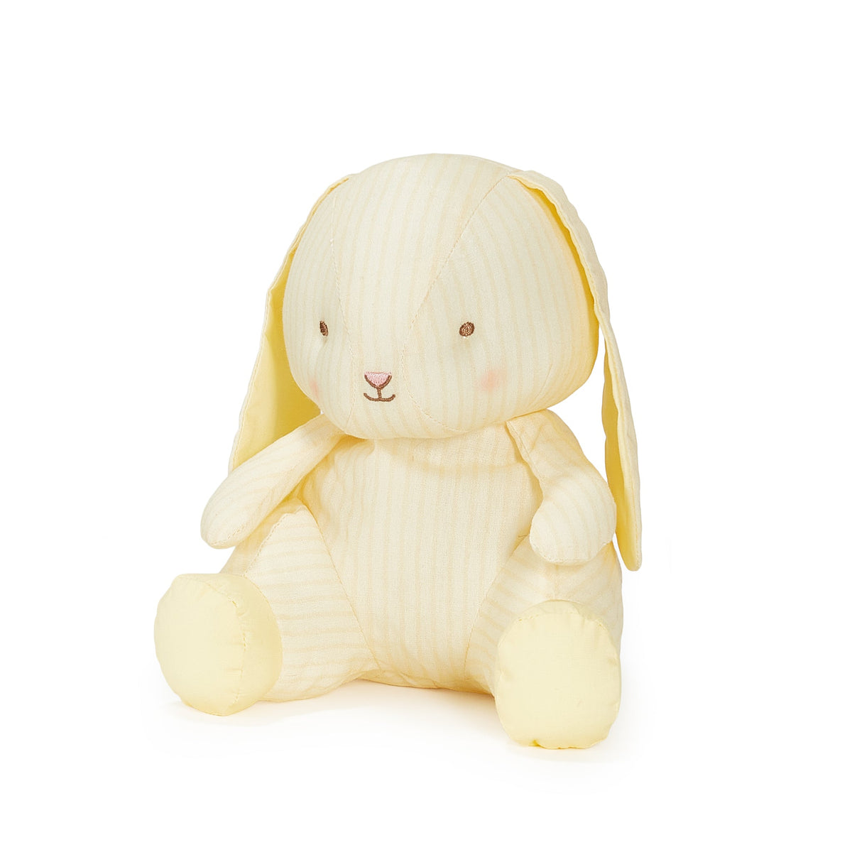 A pale yellow bunny plush toy with a vertically striped fabric, sitting on a solid white background.