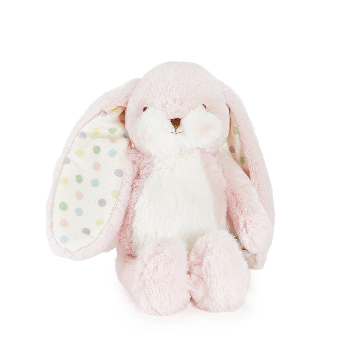 A pink and white plush bunny toy with long floppy ears featuring pastel polka dots, set against a plain white background.