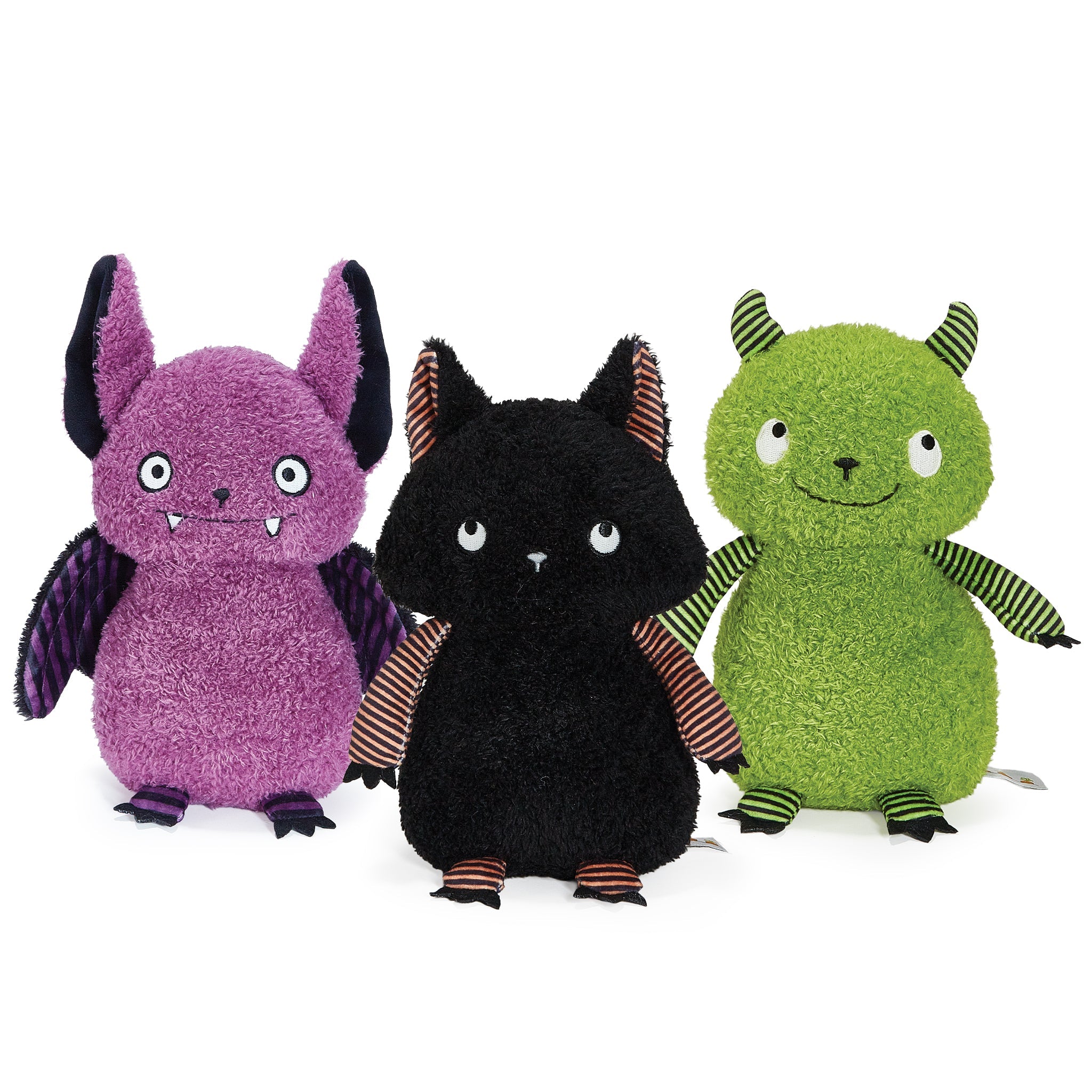 Three colorful plush toys on a white background